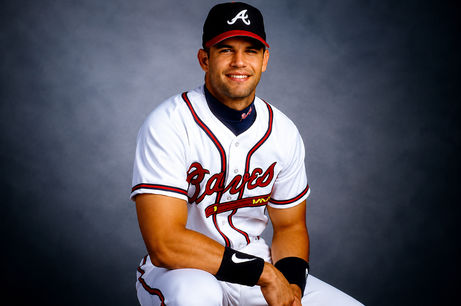Javy López posing in an Atlanta Braves baseball uniform
