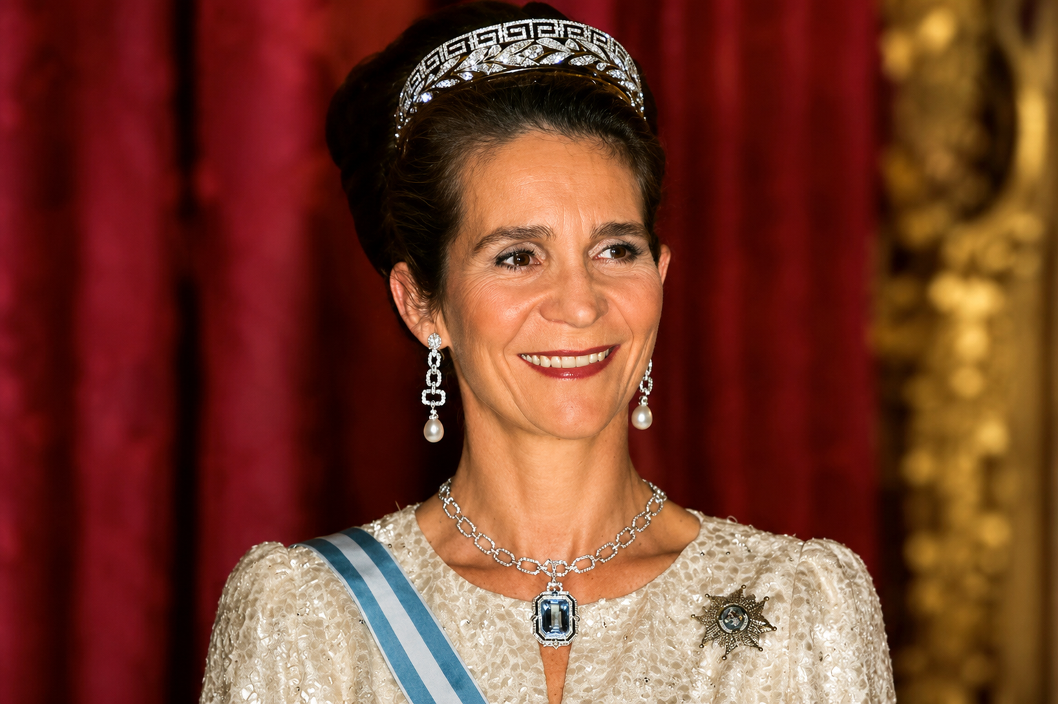 Infanta Elena in a formal royal portrait wearing a tiara and elegant gown