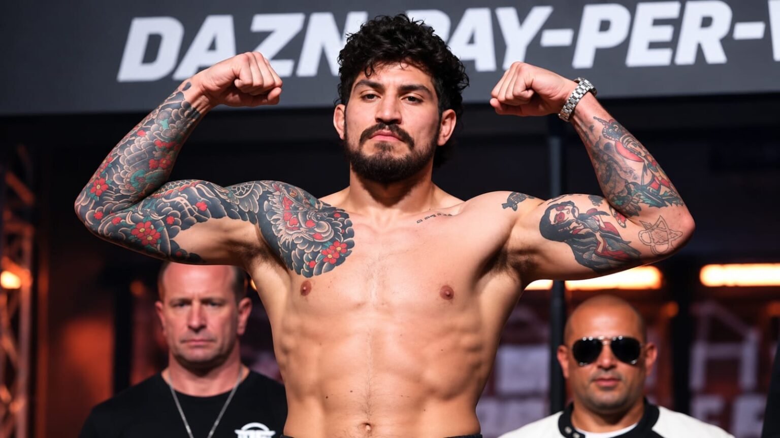 Dillon Danis net worth 2026 – flexing his muscles at a fight event