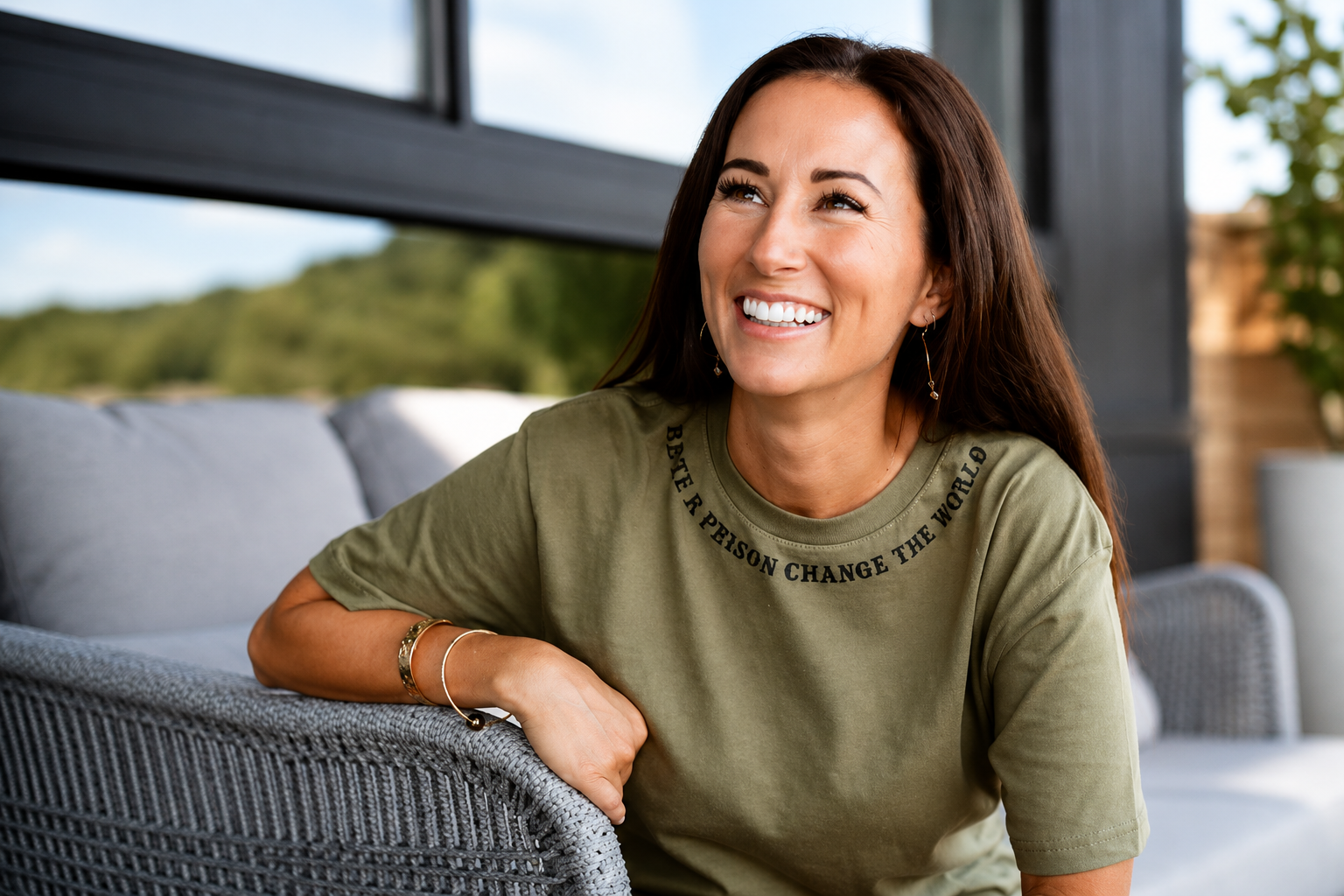 Tristyn Kalama net worth 2026 – smiling while sitting outdoors