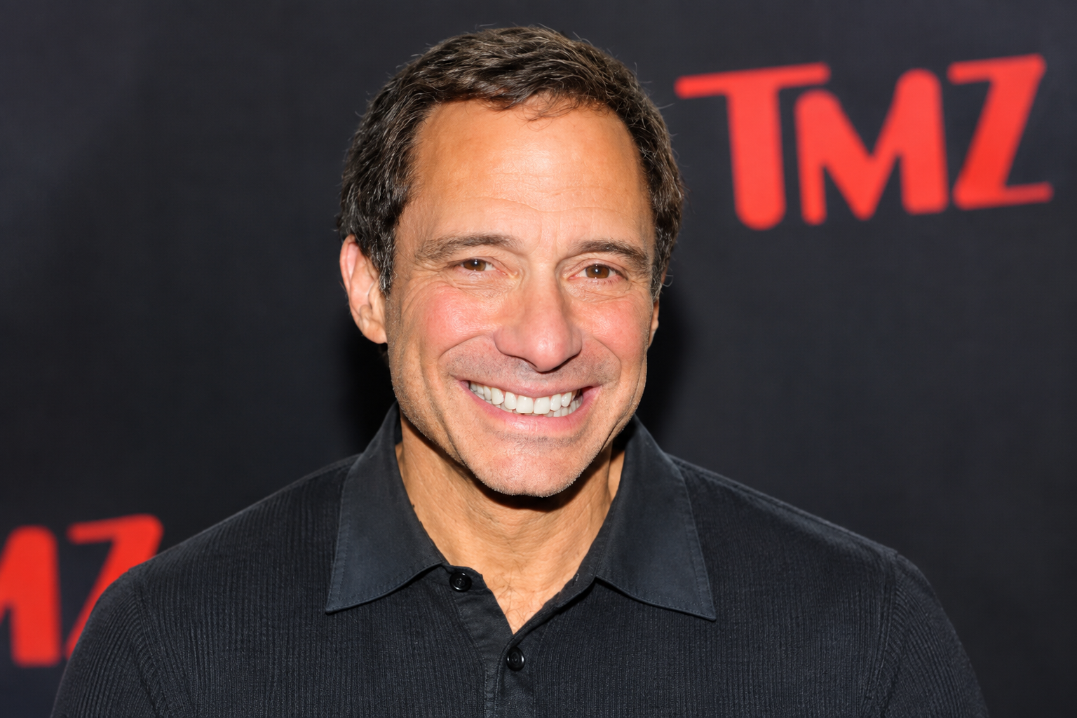 Harvey Levin net worth 2026 – smiling at a media event