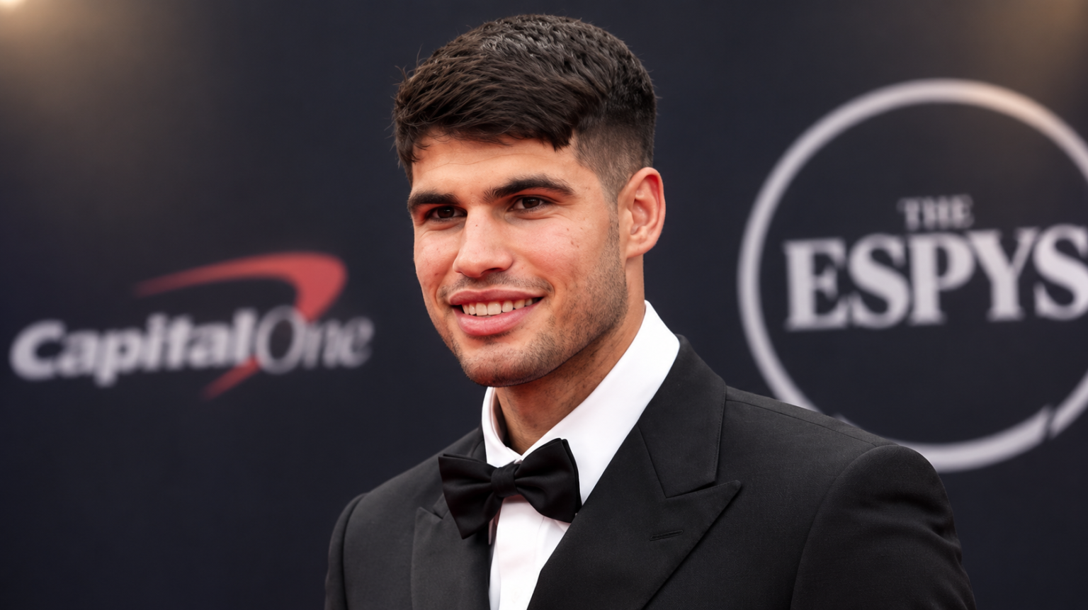 Carlos Alcaraz net worth 2026 – wearing a black tuxedo at the ESPYs red carpet