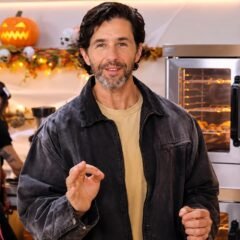 Sweet Deceit cast member in a Halloween-themed kitchen setting